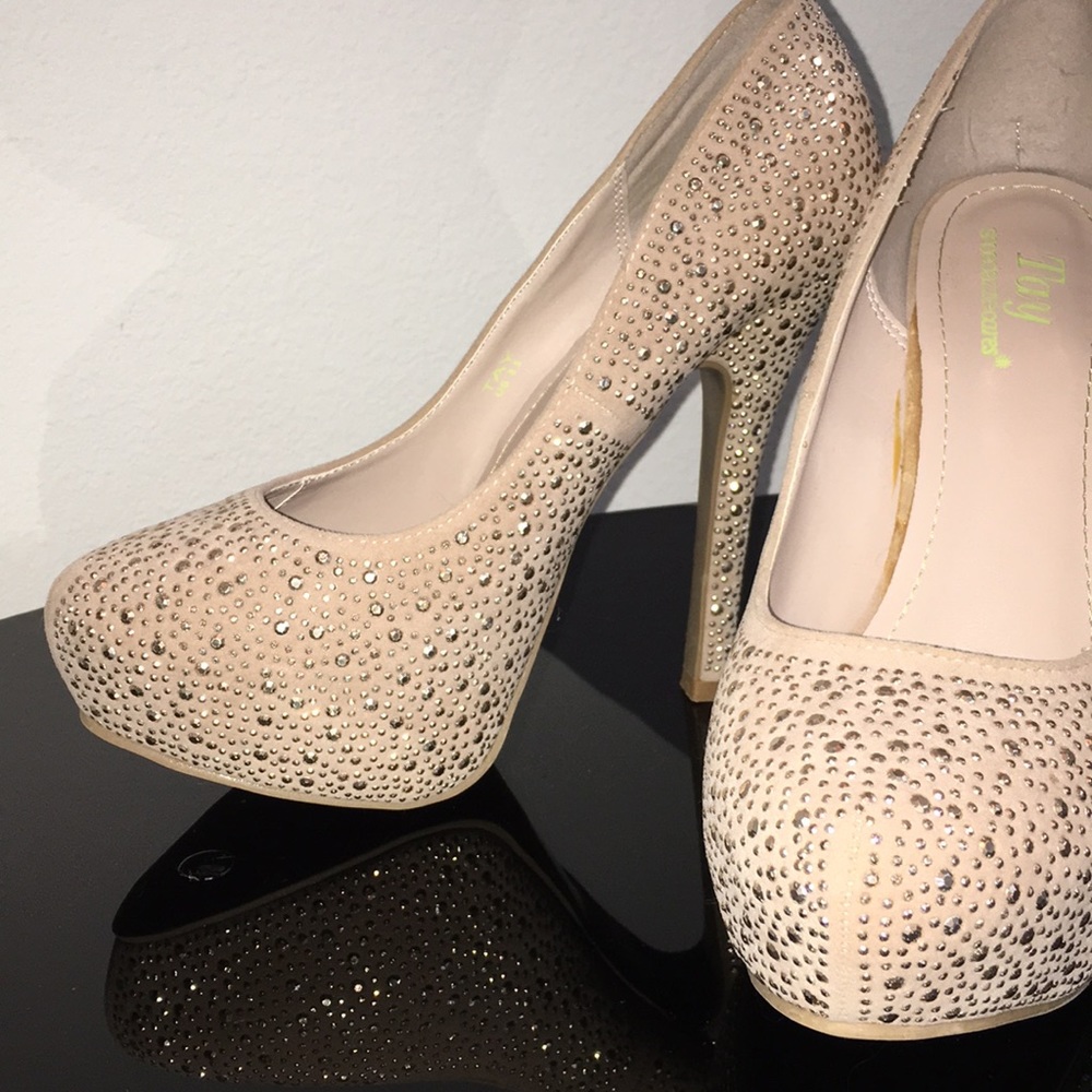 Gold studded high heel pumps